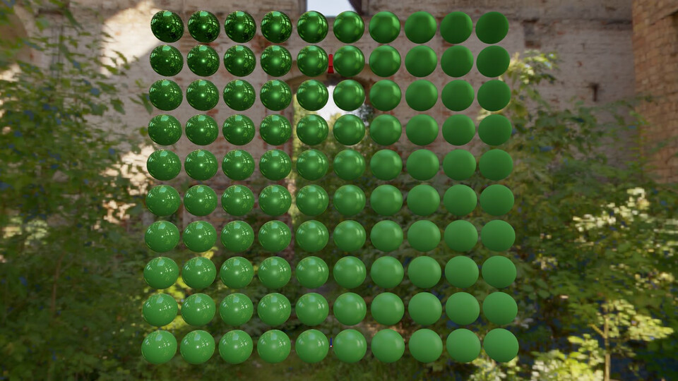 Grid of green spheres varying in roughness and metallic in an outdoor environment